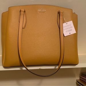 Brand-new with tags - Kate Spade purse.